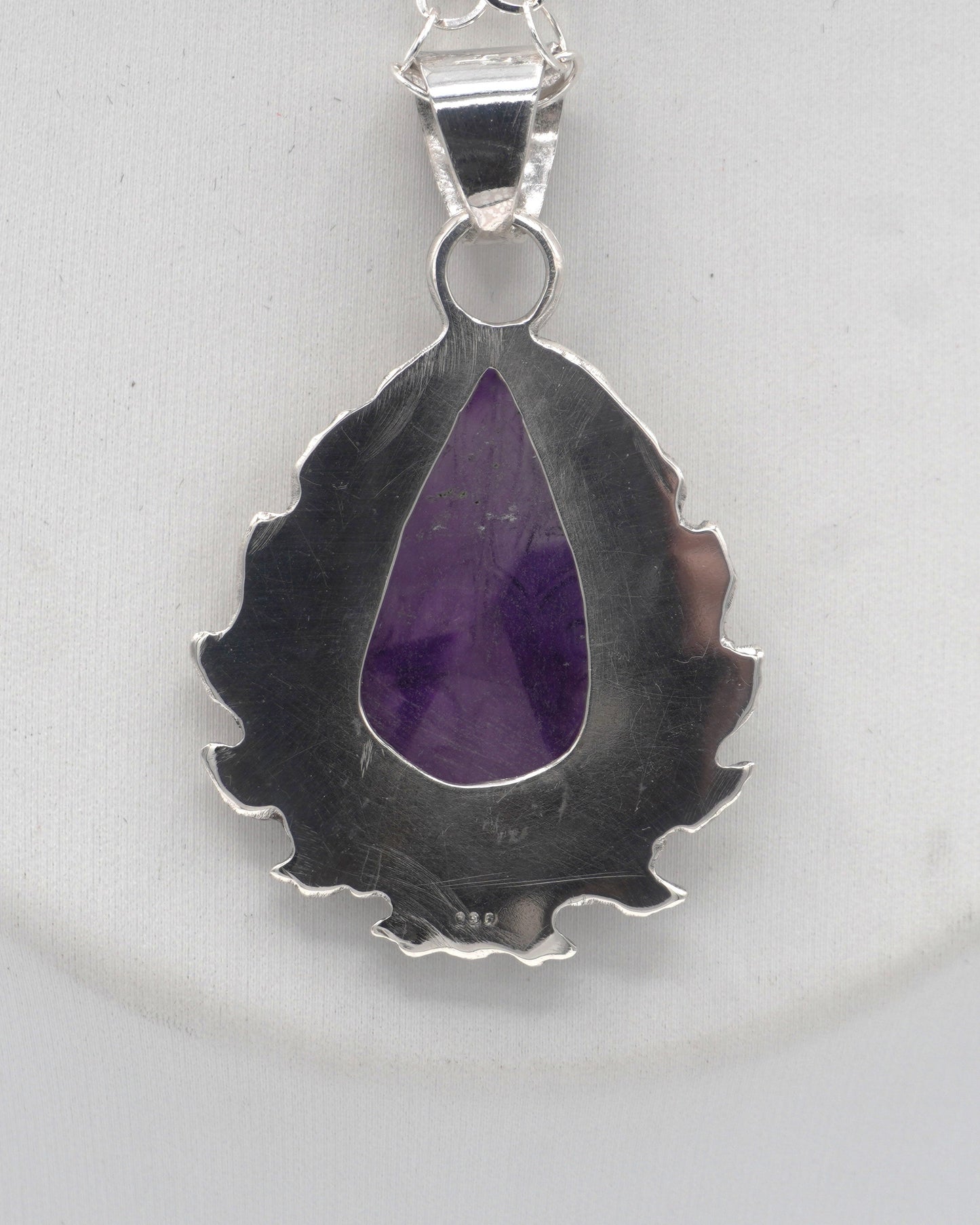 Carved Amethyst Embellished Pendant